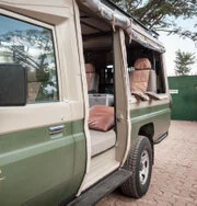 Extended safari vehicle with large windows for photographic safaris in Tanzania