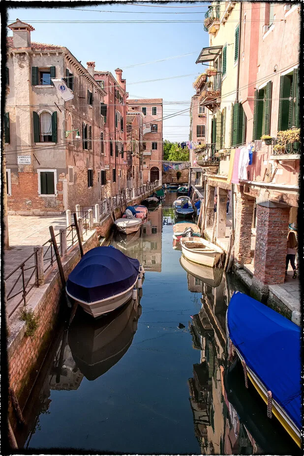 Long exposure color and black & white photograph of Venice, Italy’s canals and architecture during the day and night