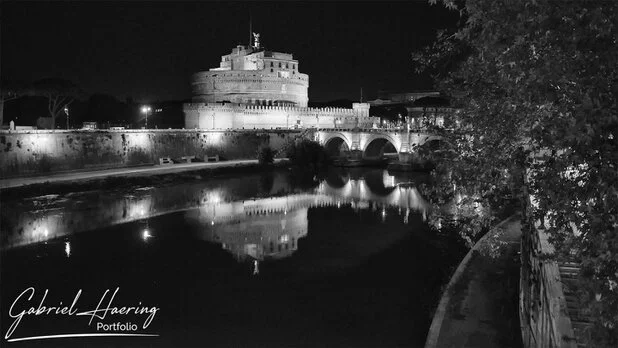 Black and white night reflection of Castel Sant’Angelo on the Tiber River