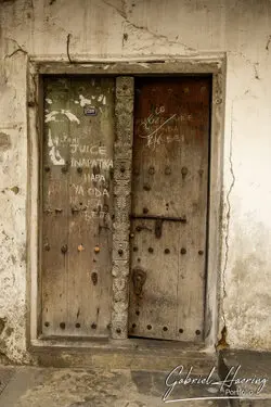 Beautifully carved wooden doors in Stone Town, showcasing Zanzibar’s artistic craftsmanship