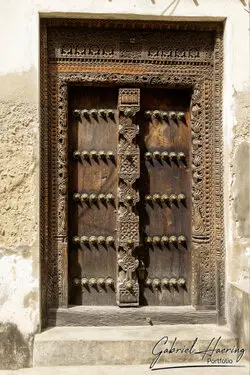 Beautifully carved wooden doors in Stone Town, showcasing Zanzibar’s artistic craftsmanship