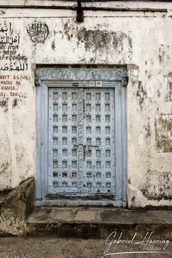 Beautifully carved wooden doors in Stone Town, showcasing Zanzibar’s artistic craftsmanship