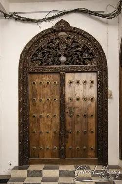 Beautifully carved wooden doors in Stone Town, showcasing Zanzibar’s artistic craftsmanship